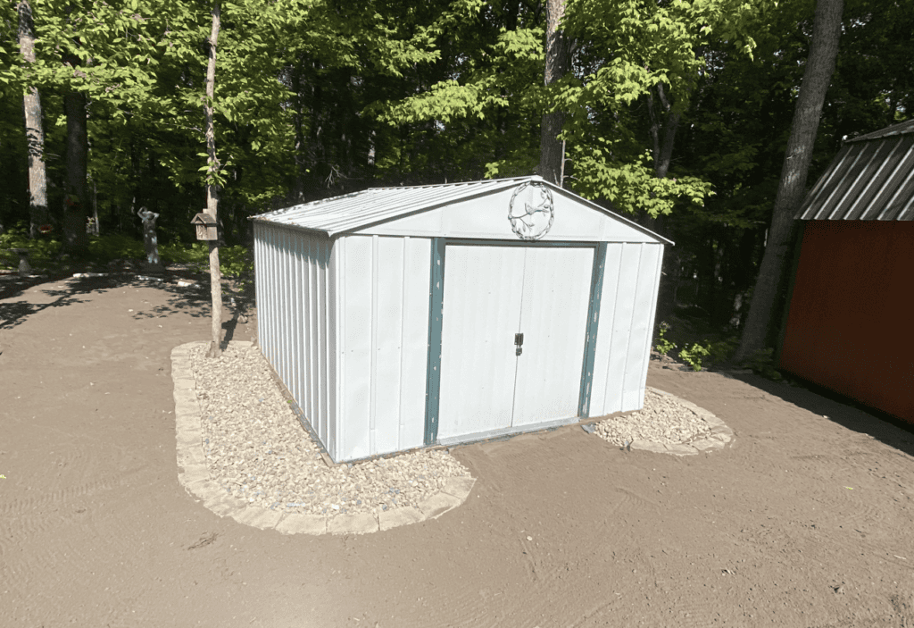 landscaping rock sand around shed pequot lakes
